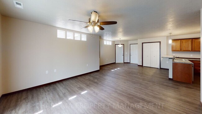 Building Photo - 2 BEDROOM, 1 BATH TOWN HOME, INDIVIDUAL ENTRANCE, ATTACHED GARAGE, PET FRIENDLY, NEWER DEVELOPMENT