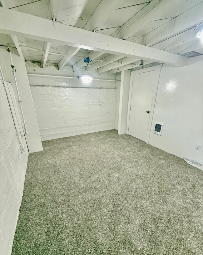Building Photo - Renovated 3 bed 1 bath fenced yard and storage shed