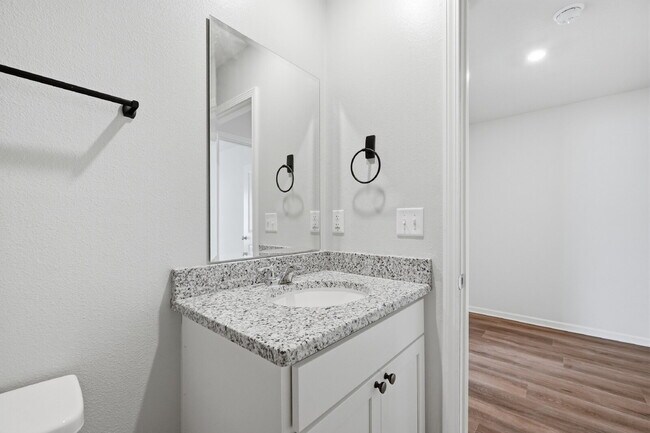 Building Photo - New community! Three bedrooms, two bathrooms and ready for you to move into!