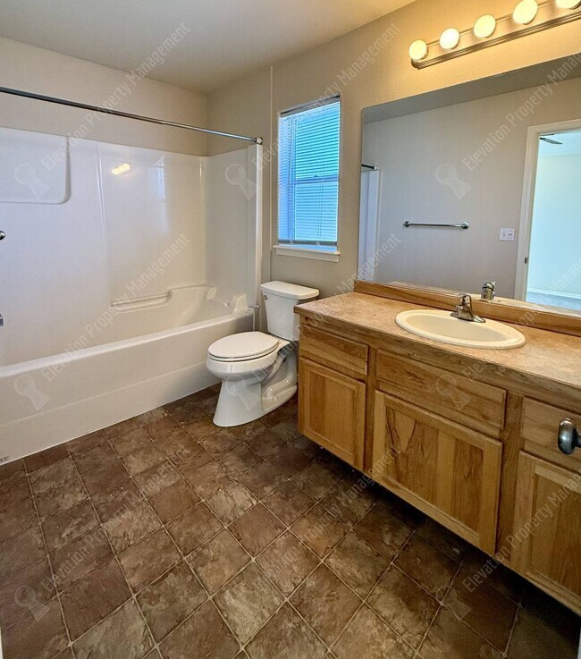 Building Photo - Updated 3 BR/2.5  BA with new flooring and paint!