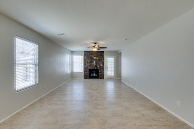 Building Photo - 2 bedroom + Den- Upgraded Flooring ready for immediate move in