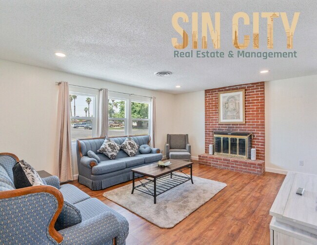 Building Photo - "Charming 4-Bedroom Retreat in Las Vegas –...