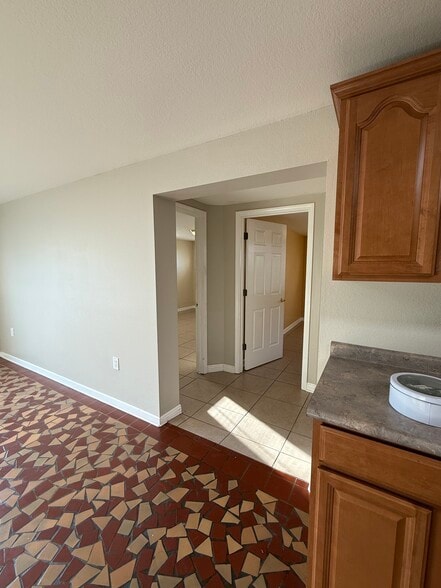 Kitchen looking into bedrooms - 2912 Delille St