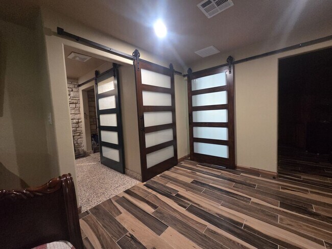 Building Photo - Custom built condo! Country Living! Offered unfurnished OR furnished!