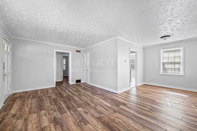 Building Photo - A MUST SEE !!!! FULLY RENOVATED AND SECTION 8 WELCOMED !!!!!