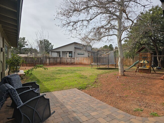 Building Photo - Furnished, 1-Year Long-Term Rental