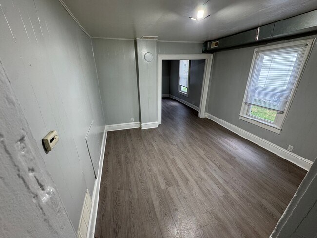 Building Photo - Interested in a two-bedroom house that includes a large garage. Please let us know