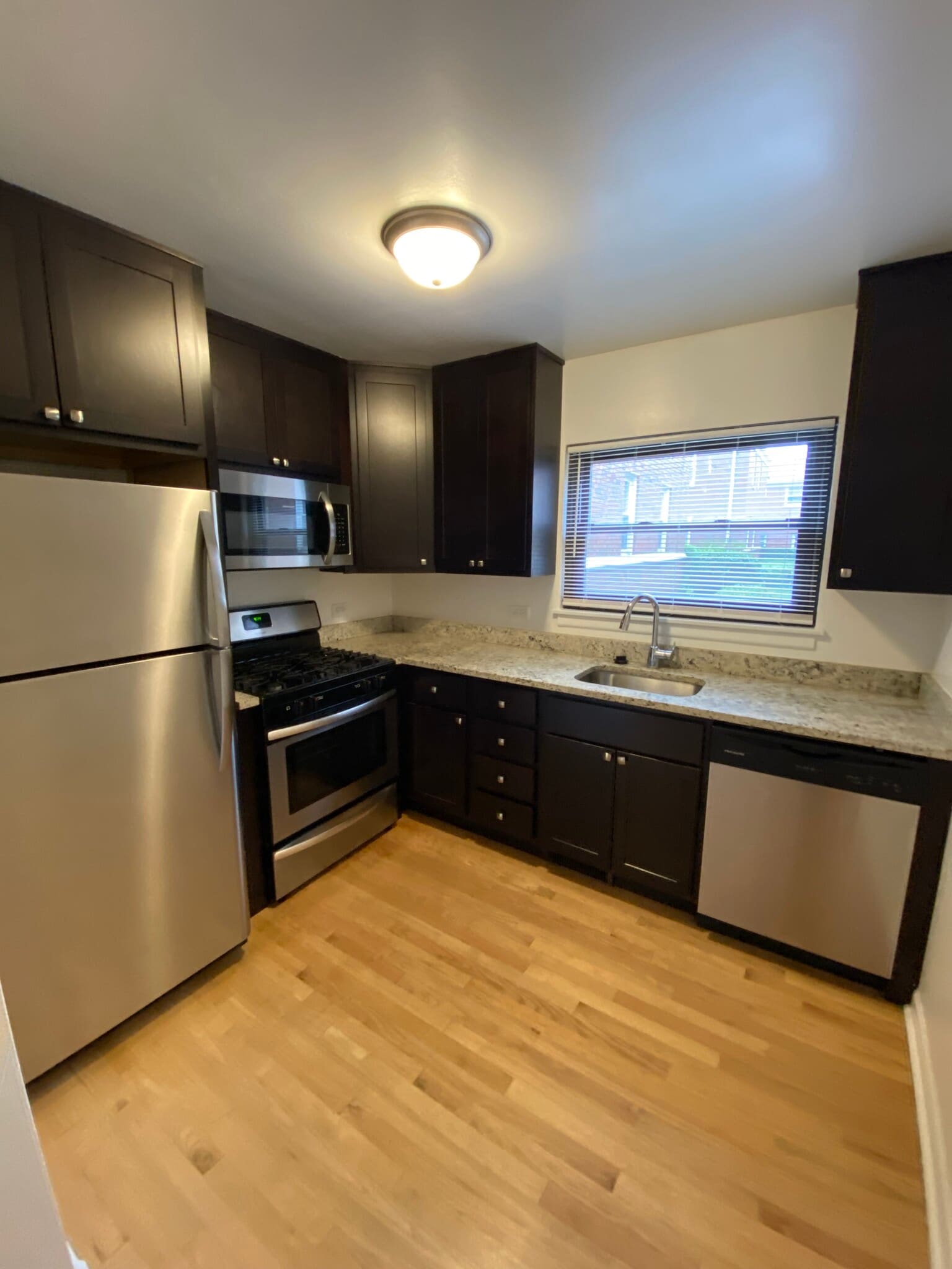 Modern Kitchen with Stainless Steel Appliances - 1942 Linden Ave