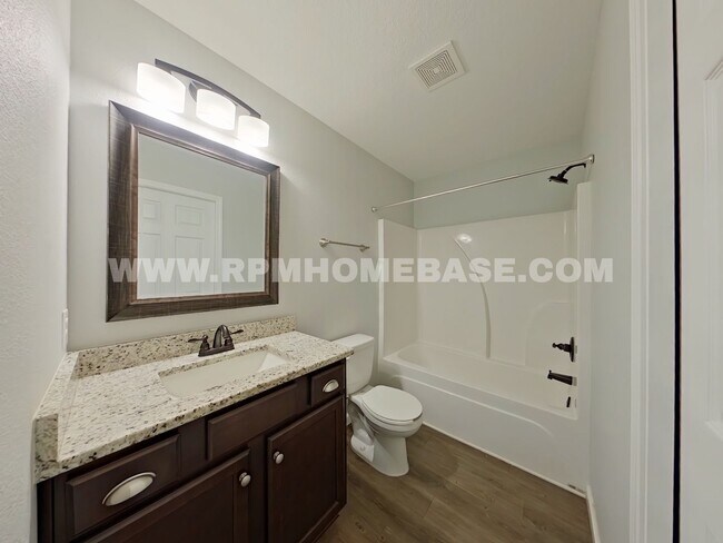 Building Photo - Your Baker Sanctuary with Spacious Backyar...