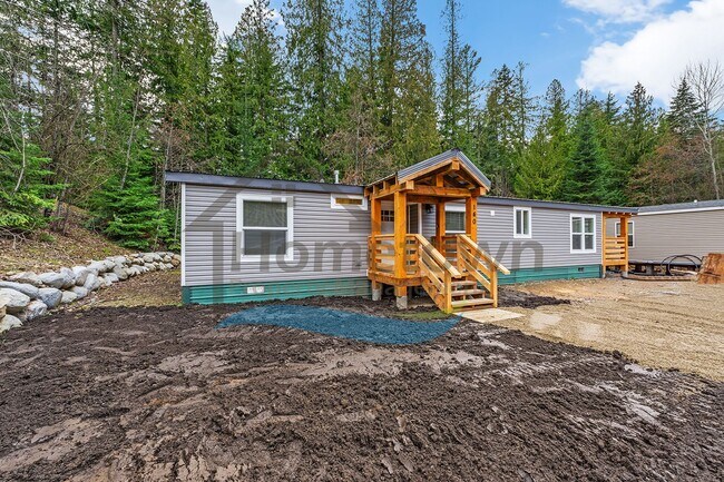 Building Photo - 3 Bedroom 2 Bathroom Home with Off-Street Parking Available in Sagle, Idaho!