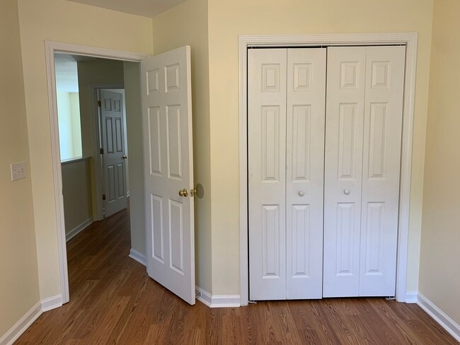 Building Photo - SPACIOUS HOME WITH DOWNSTAIRS PRIMARY BEDROOM AND BATH- LAKE WHEELER/ FARMER'S MARKET AREA