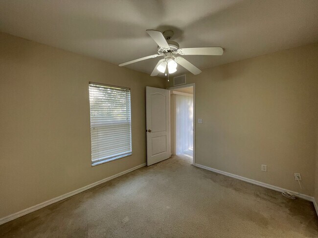 Building Photo - PRICE REDUCTION: Spacious and Charming 3 B...