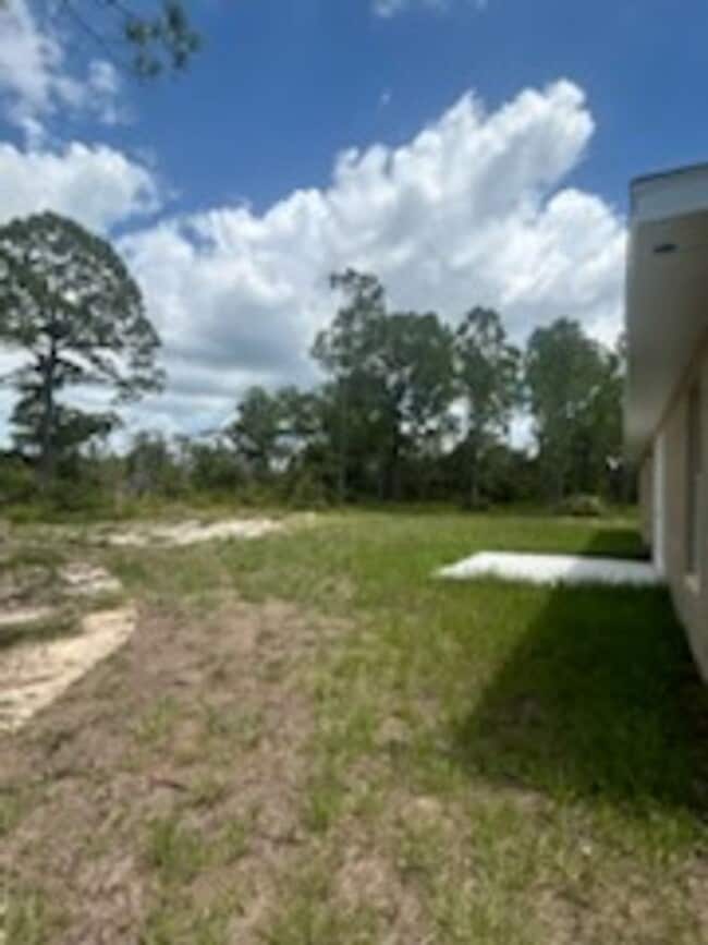 Building Photo - 3/2/1 Single Family Home Available-Cozy Pe...