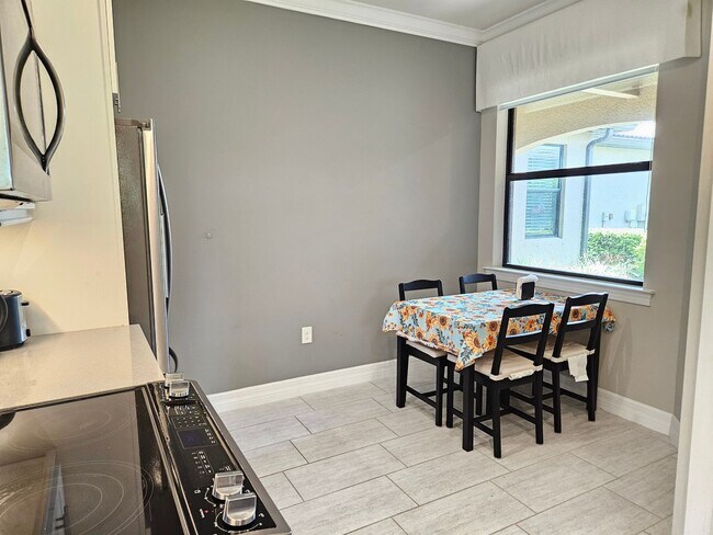 Building Photo - Stunning Model Home – 2 Bedrooms plus Den,...