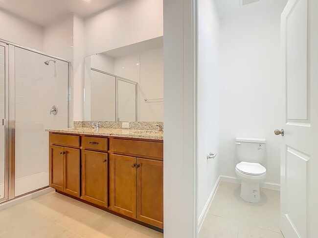 Building Photo - New Luxury Townhome in Celebration, FL Corner unit.  All porcelain tiled floors.  Aleutian model ...