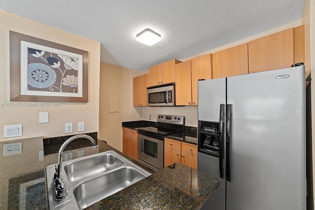 Building Photo - 1760 Palm Cove Blvd