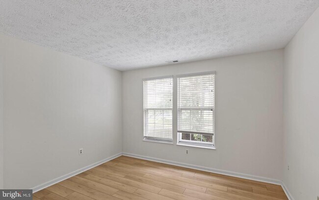 Building Photo - Welcome to Piney Orchard! This beautifully updated 2-bedroom, 2-bath condominium!