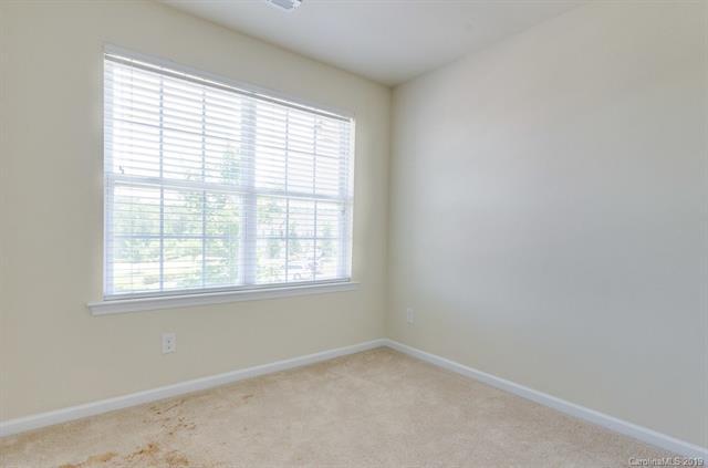 Building Photo - "Charming 3-Bed Oasis with Granite Accents & Pool Retreat in Belmont!"