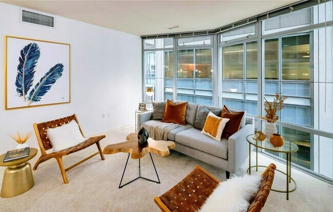 Living room with floor to ceiling windows - 819 Virginia St