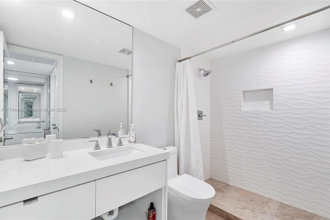 Building Photo - 5555 Collins Ave