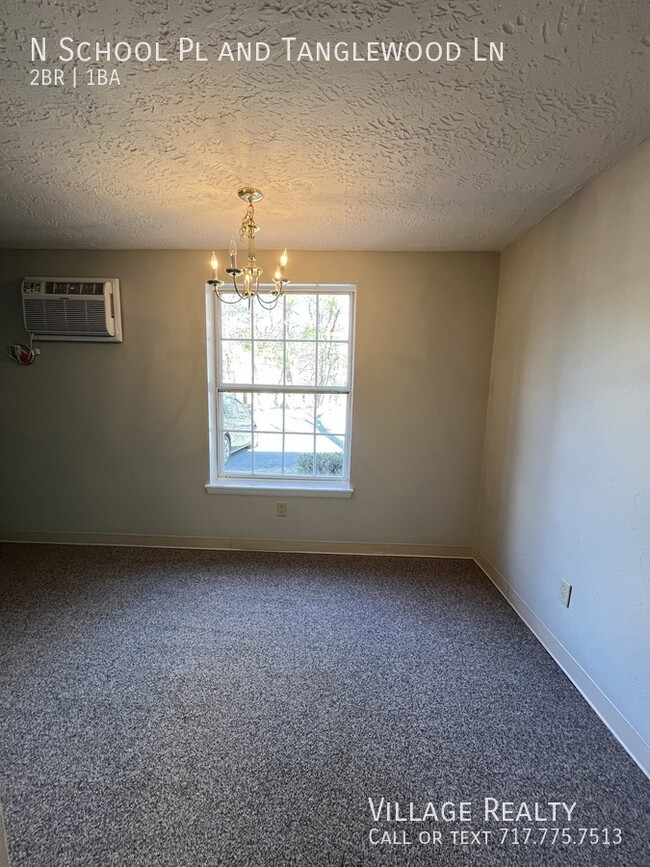 Building Photo - No Steps! Roomy 2-Bed with A/C & Off-Stree...