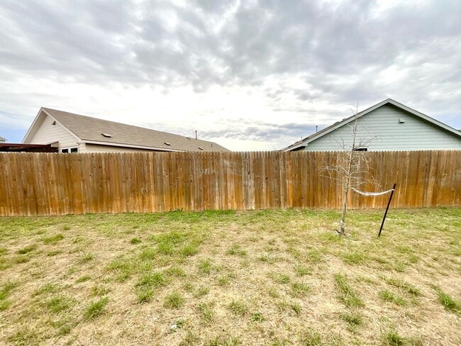 Building Photo - *MOVE IN SPECIAL* Beautiful 4BR/2BA Home with Fenced Yard & Garage!