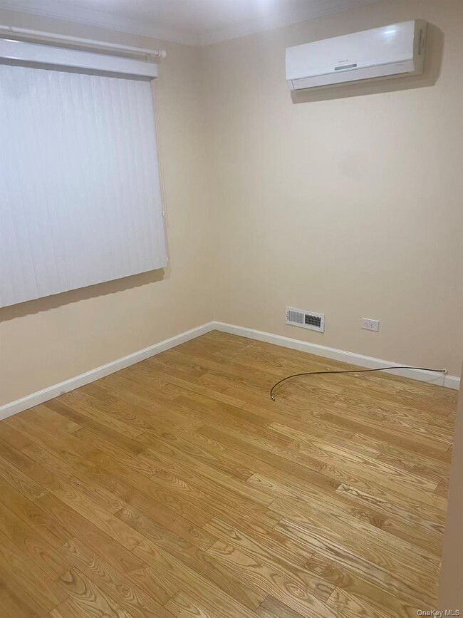 Building Photo - 207-24 28th Ave