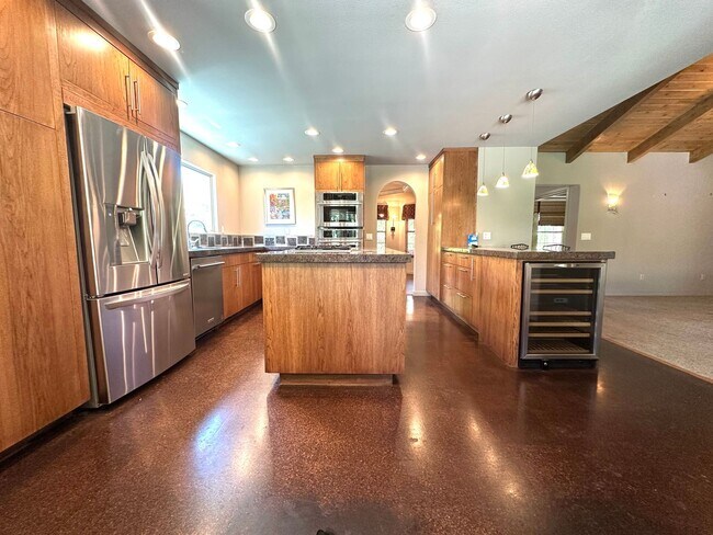 Building Photo - Beautiful 3-Bedroom Home with Open Floor Plan & Private Backyard