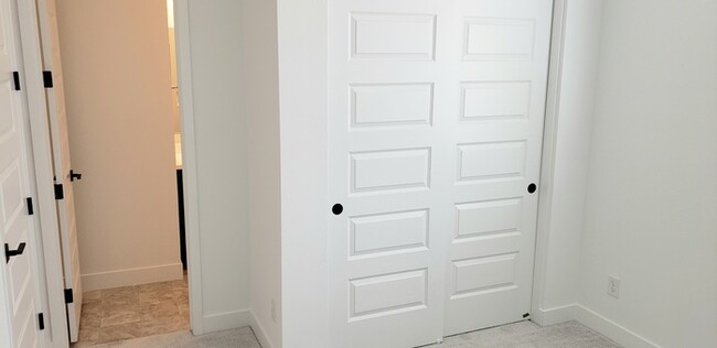 Building Photo - The 2 YEARS NEW 4 bedroom + 3 car garage r...