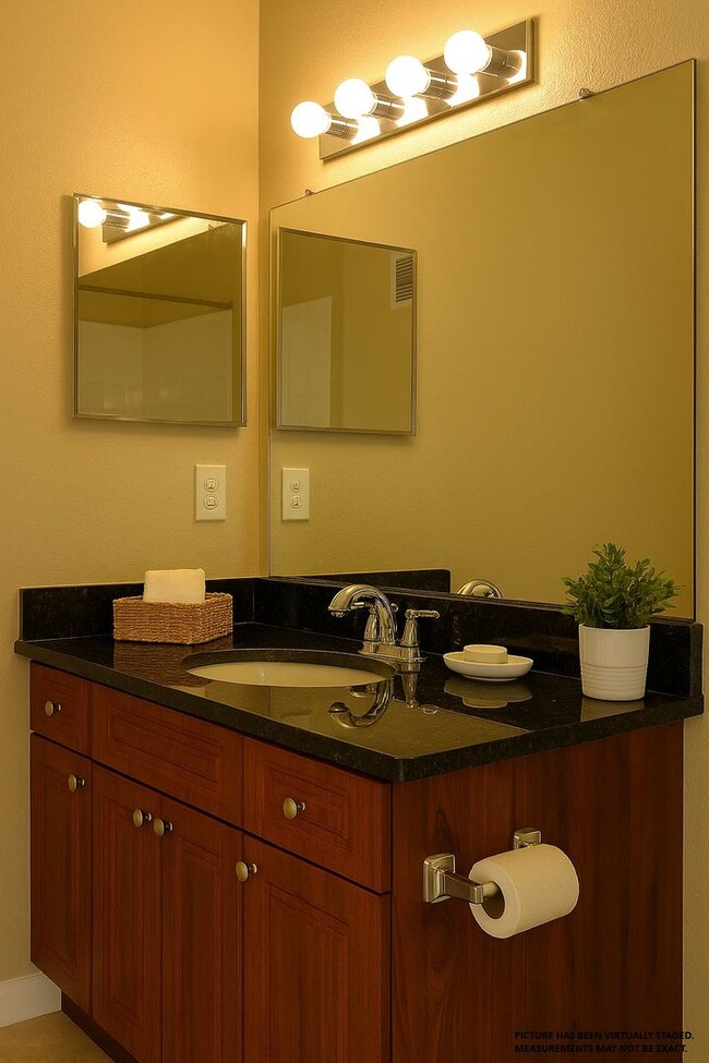 Building Photo - Spacious 2 bed 2 bath condo, split floorplan on the 3rd floor! Gated community at Mosaic at Millenia