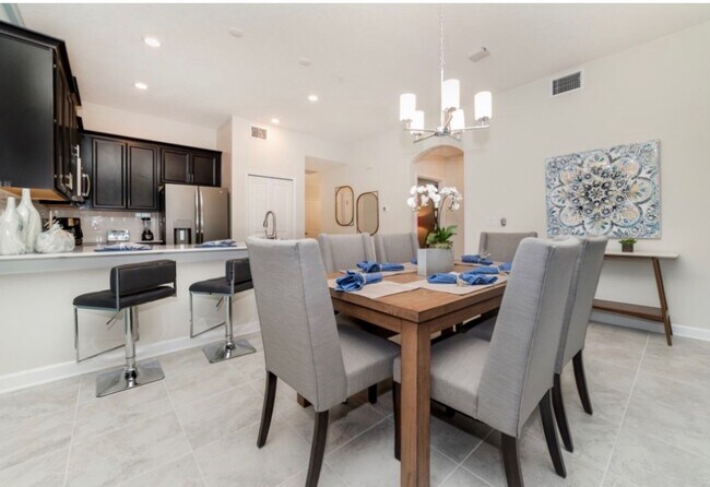 Building Photo - BEAUTIFUL CHAMPIONS GATE 2 BED 2 BATH COND0  w/GARAGE - FULLY FURNISHED - 12 MONTH RENTAL