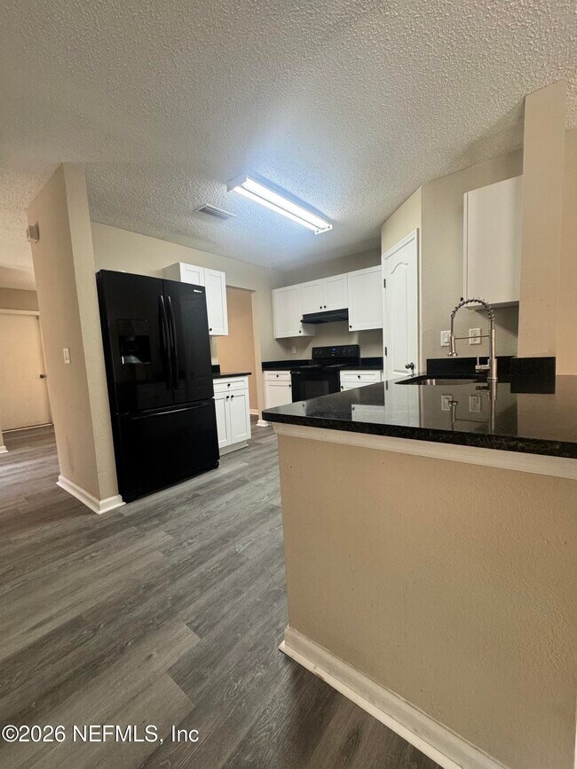 Building Photo - 7772 Playschool Ln