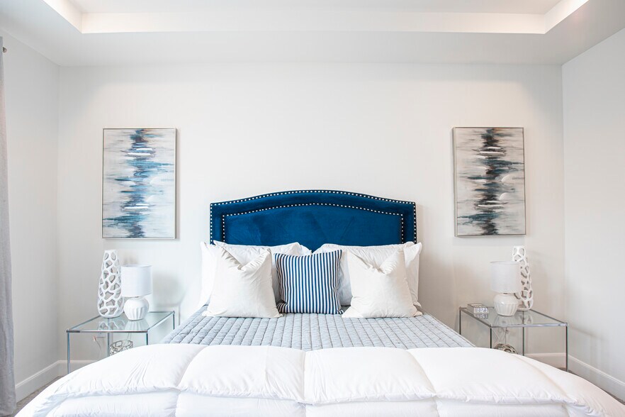 Night stands with lamps are great for late night reading. - 2713 Eado Edge Ct