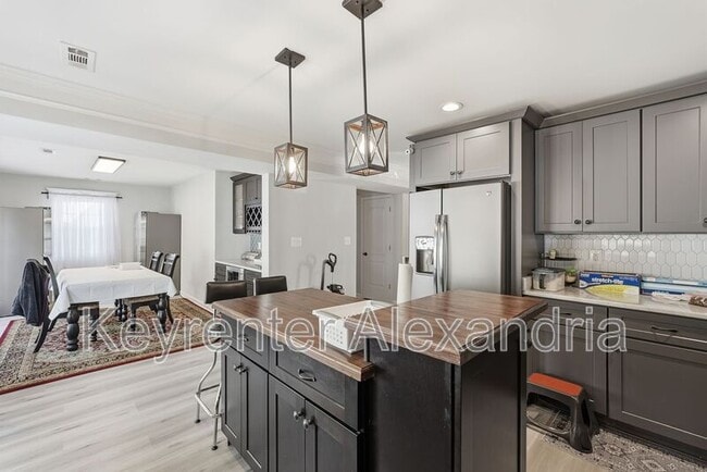 Building Photo - 6022 Rixey Dr