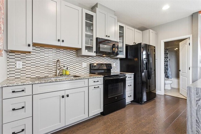 Building Photo - 7055 Scarlet Ibis Ln