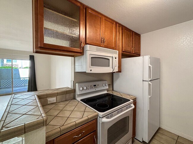 Building Photo - Charming 2BD/2BA Condo in La Mesa W/ A/C, ...
