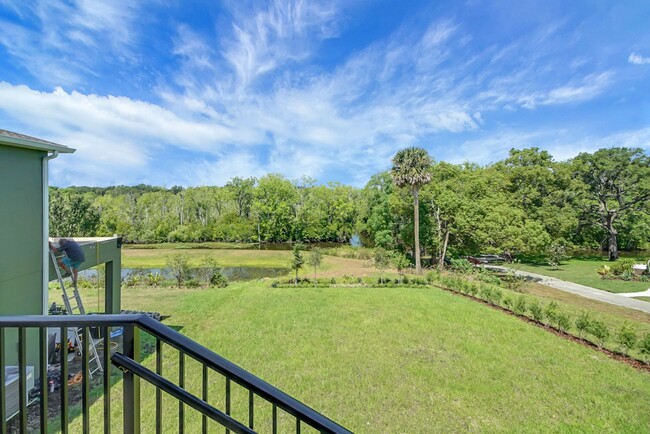 Building Photo - Stunning 4/3 in Gated Dora Parc! Water Views!