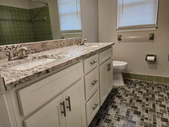 Building Photo - Remodeled Brick Rancher With a Screened Po...