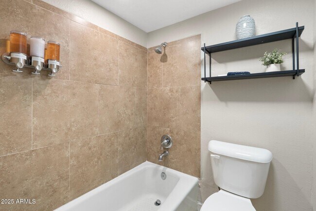 Building Photo - 8570 E Indian School Rd