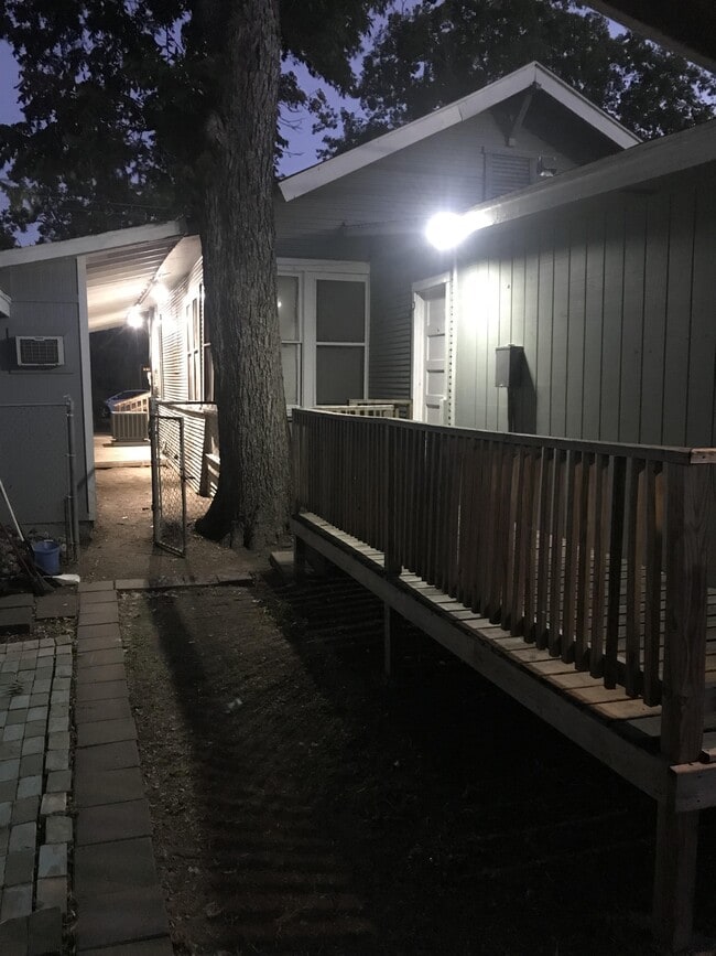 Separate gate to keep pets in the rear yard, but the entire property is gated - 1105 Essex St