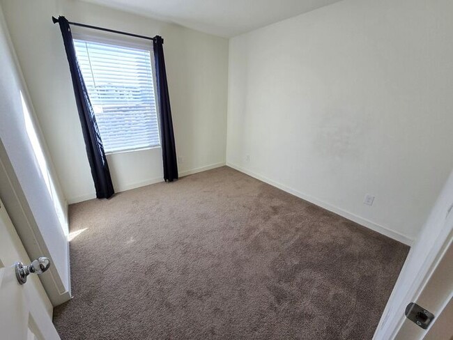 Building Photo - Modern 3-Bedroom Townhome with 2-Car Garage, Bright Interiors & Private Patio