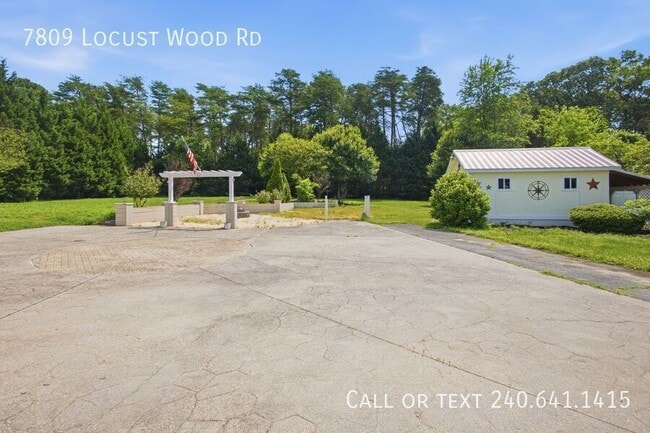 Building Photo - 7809 Locust Wood Rd