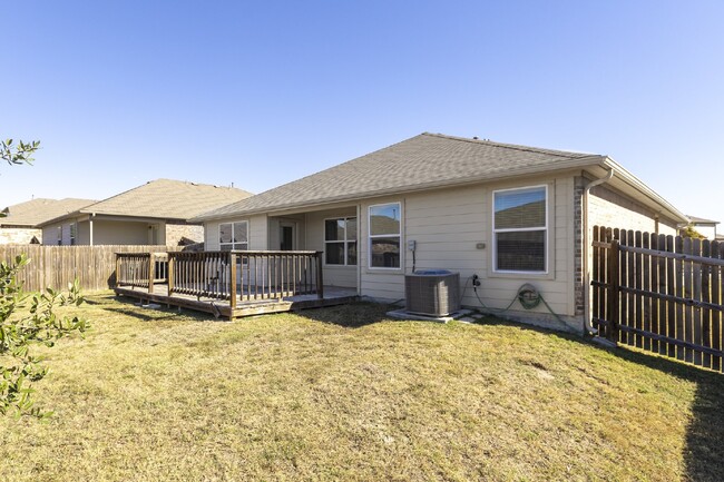 Building Photo - Kyle Home has Large Deck for Entertaining!