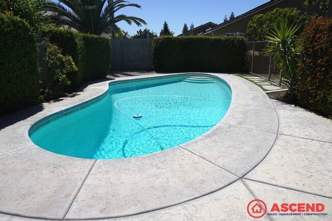 Building Photo - Stunning Split-Wing Home in Bakersfield's Desirable 93314 — Pool, Upgrades Throughout & Pets Welc...
