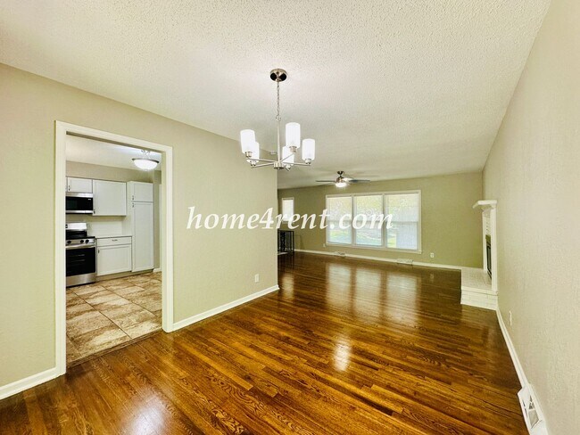 Building Photo - Updated Raytown Ranch w/ Wood Floors, SS Appliances, Finished Basement and a Fenced Yard!
