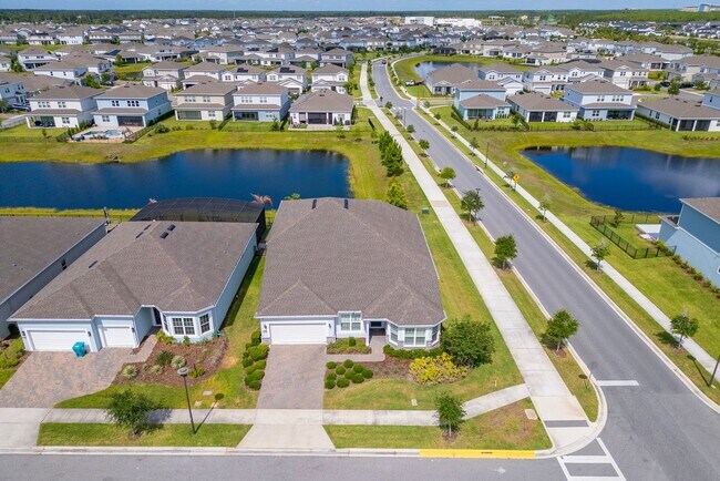 Building Photo - Immaculate Executive Home in Isles of Lake Nona