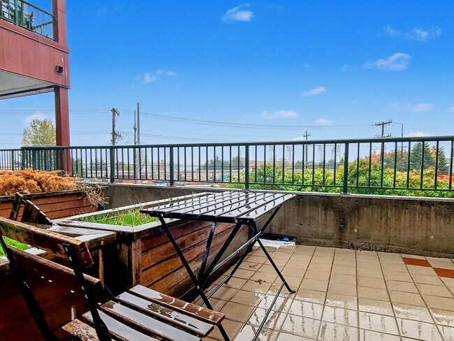 Building Photo - AVAILABLE NOW! Beautiful Queen Anne Condo with Puget Sound Views & Secure Parking!
