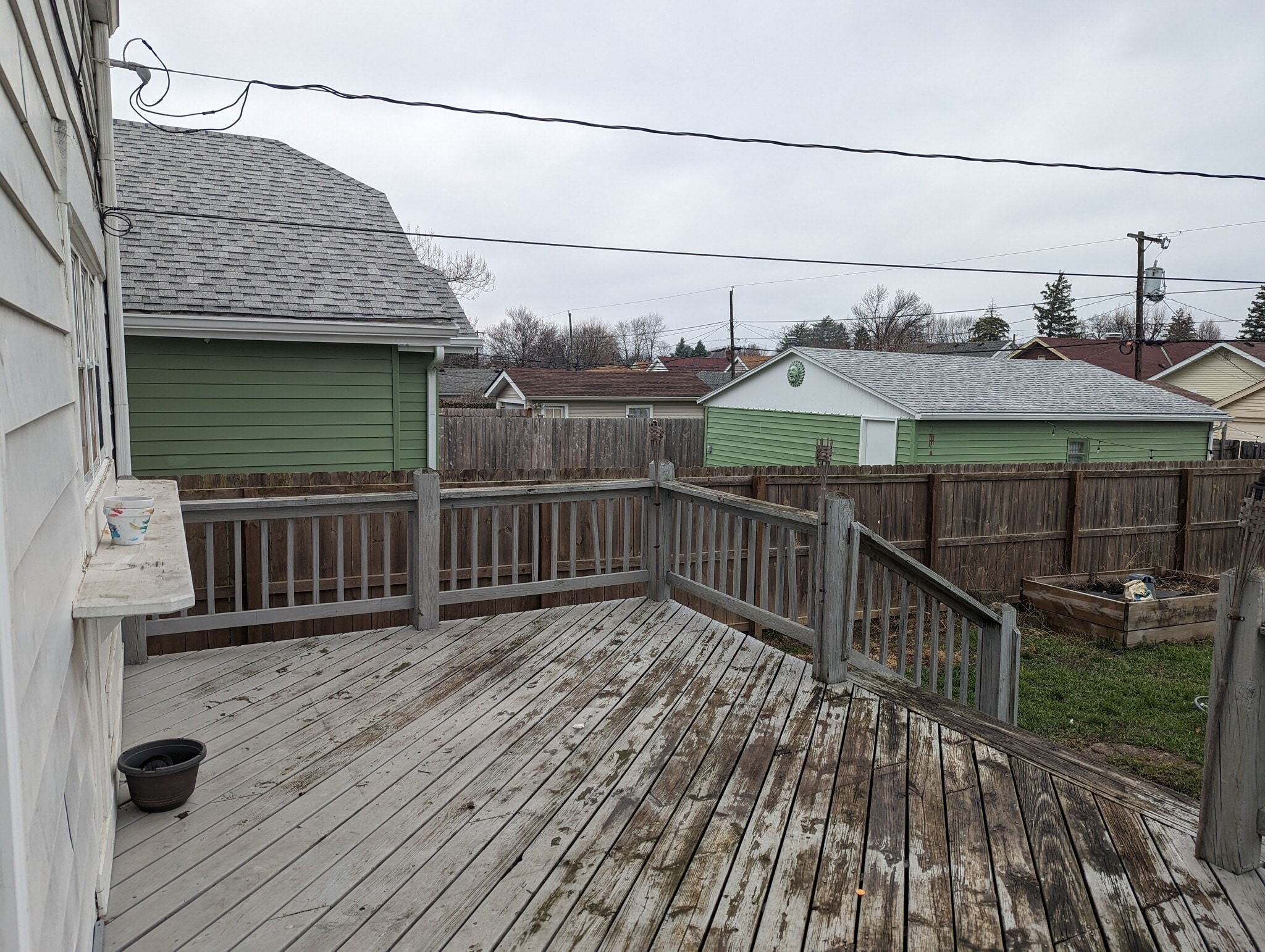 Large back porch, with countertop connected to kitchen window. - 1042 Cameron St