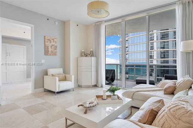 Building Photo - 15811 Collins Ave