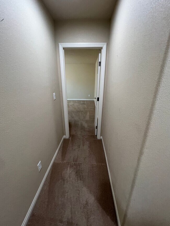Building Photo - A Fantastic 4 Bedroom Home with the primary Downstairs, in Silverado Ranch